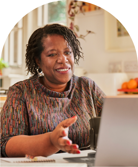 photo of a person working on a laptop